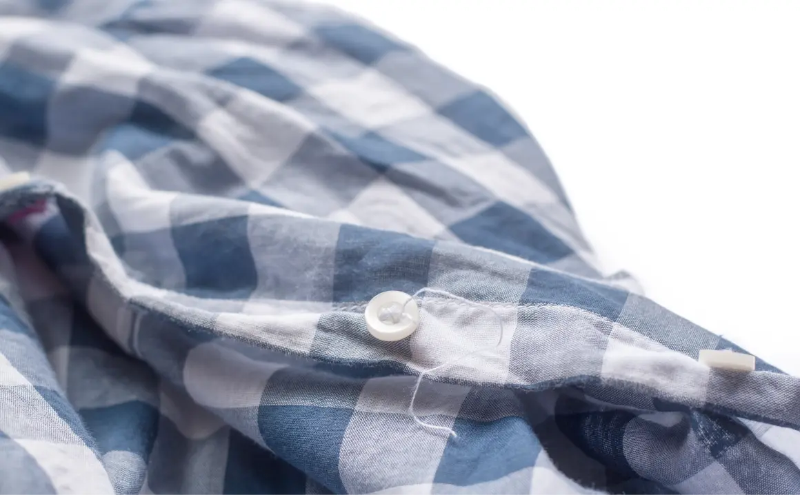 A shirt with a missing button